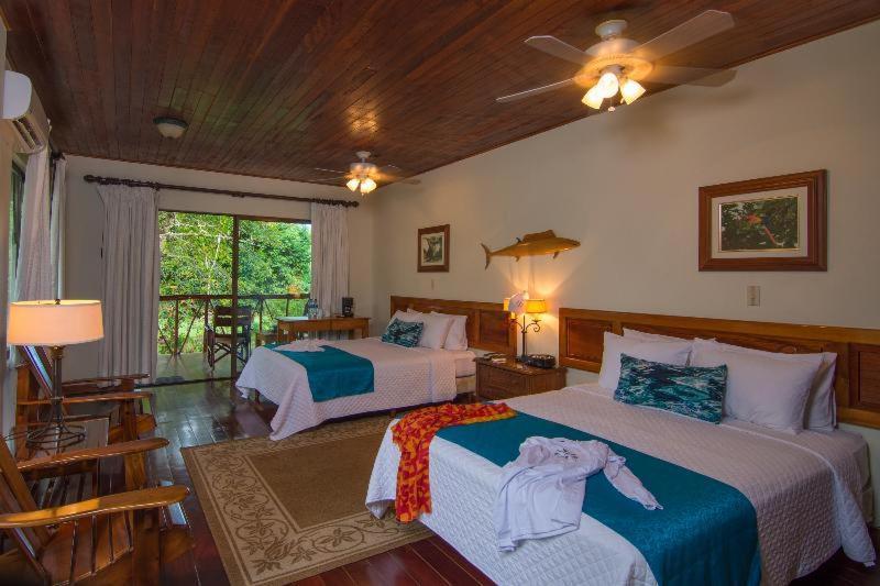 คร็อกโคดายล์ เบย์ รีสอร์ต Hotel ปัวร์โตคิมาเนซ ห้อง รูปภาพ